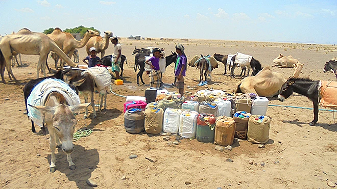 معانات جلب الماء معانات جلب الماء